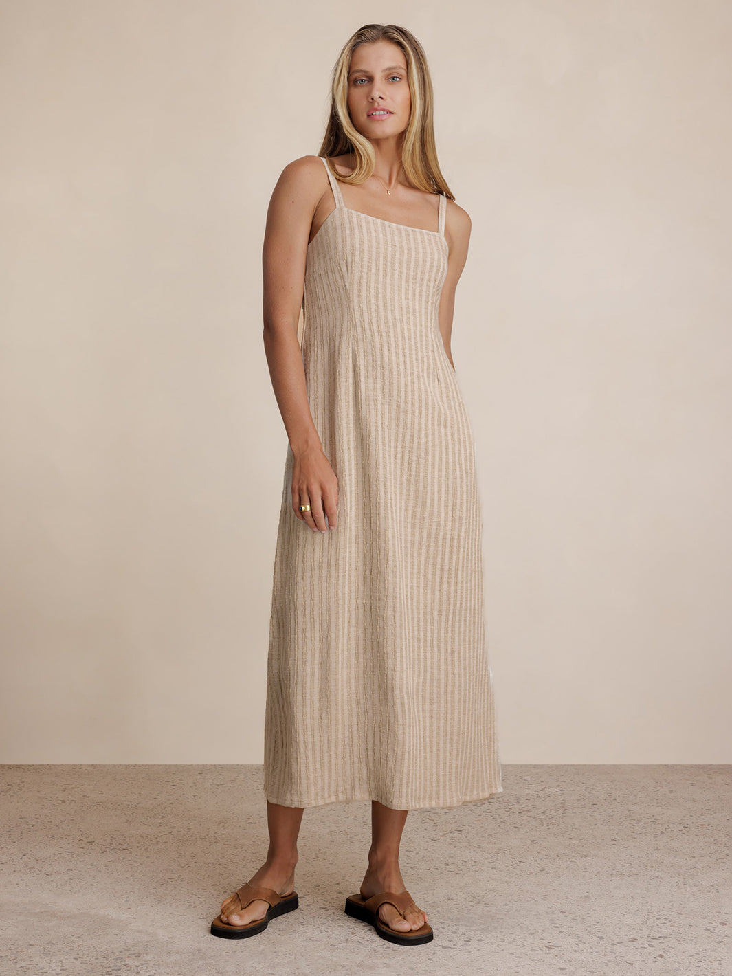 Model wears Mahlia Linen Blend Midi Dress in Stripe