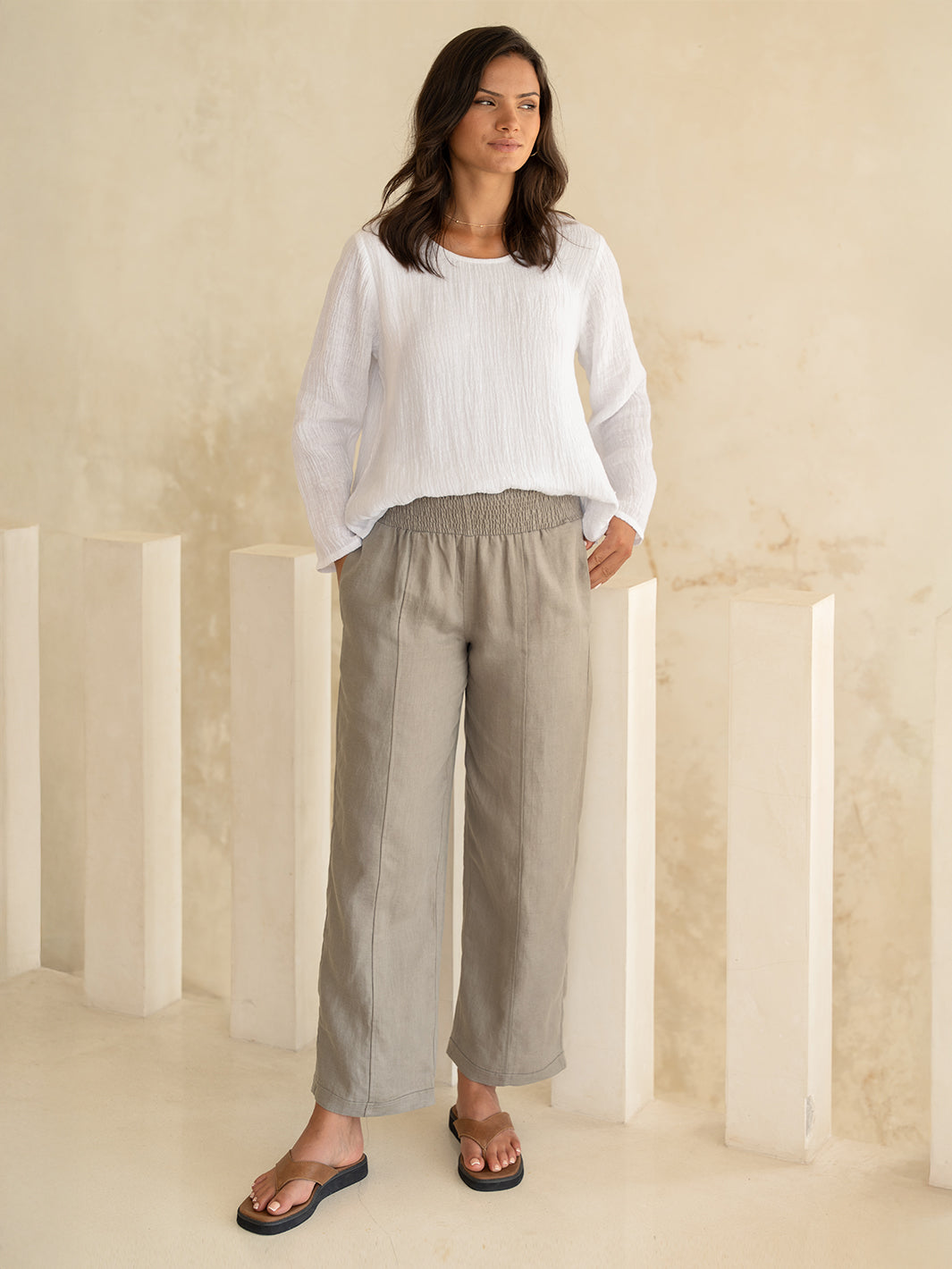 Model wears Morrissey Linen Pants in Taupe