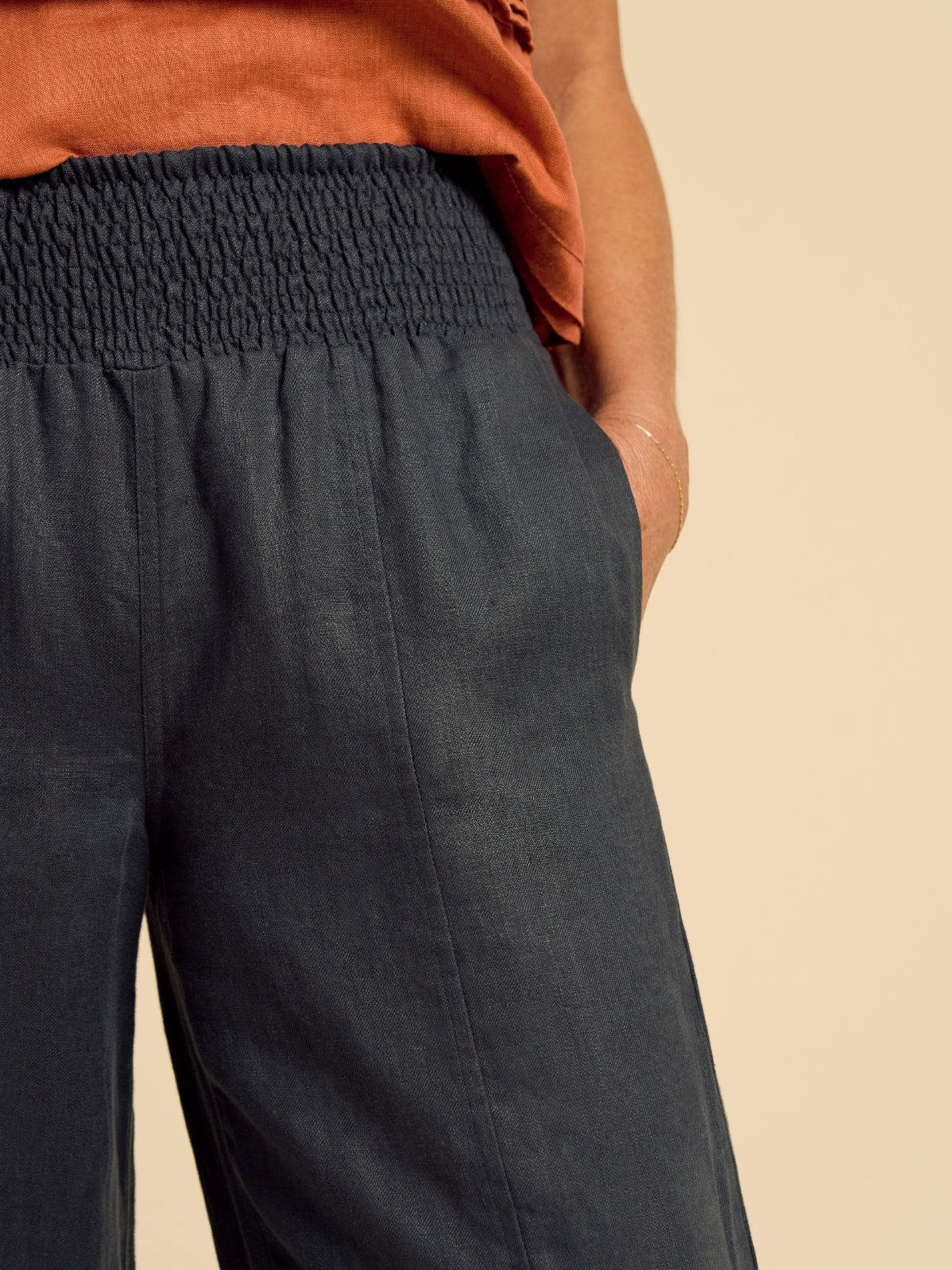 Model wears Morrissey Linen Twill Pants in  Charcoal