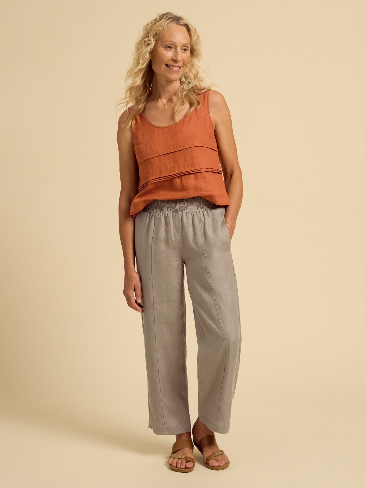 Model wears Morrissey Linen Pants in Taupe
