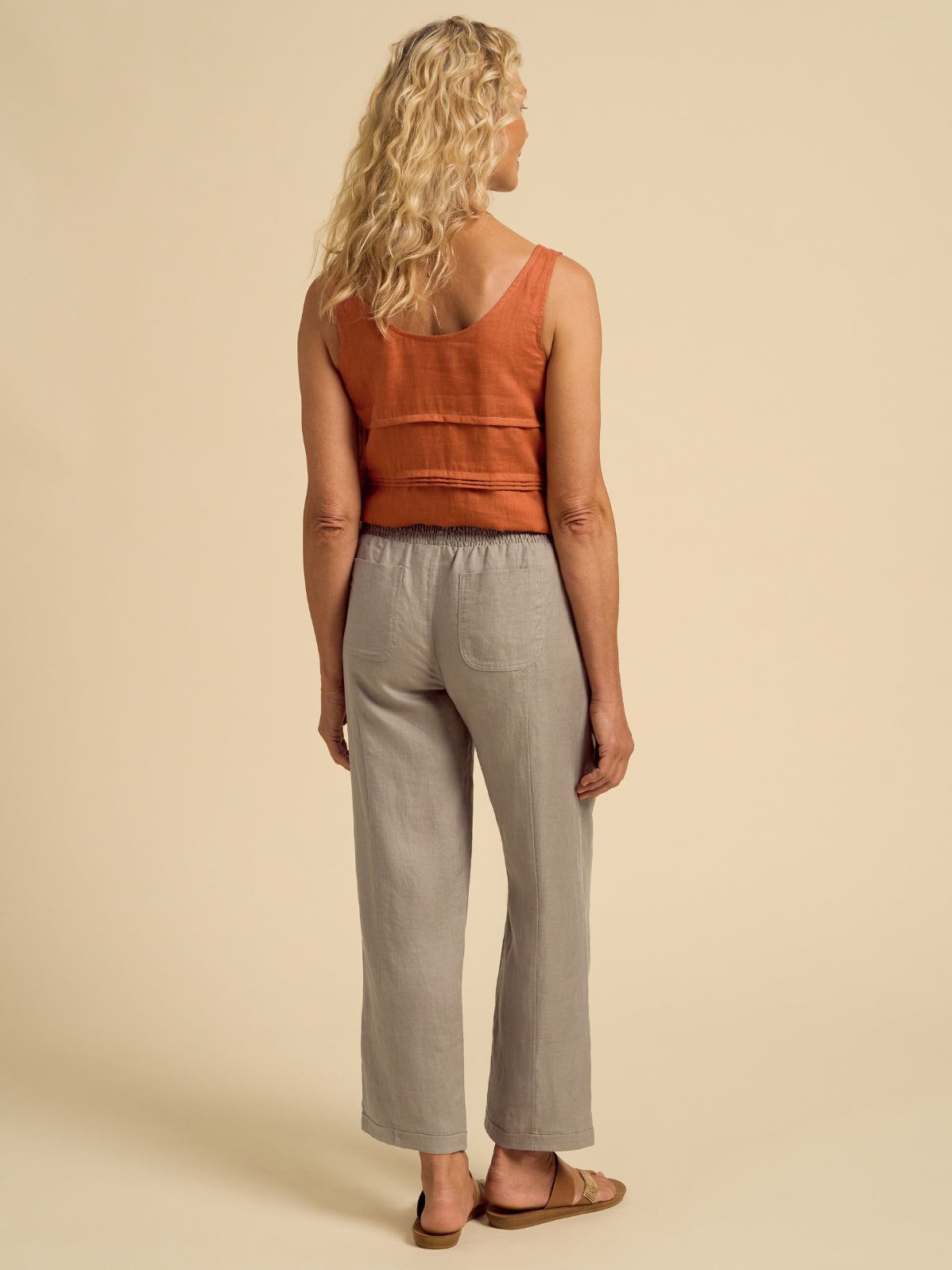 Model wears Morrissey Linen Pants in Taupe