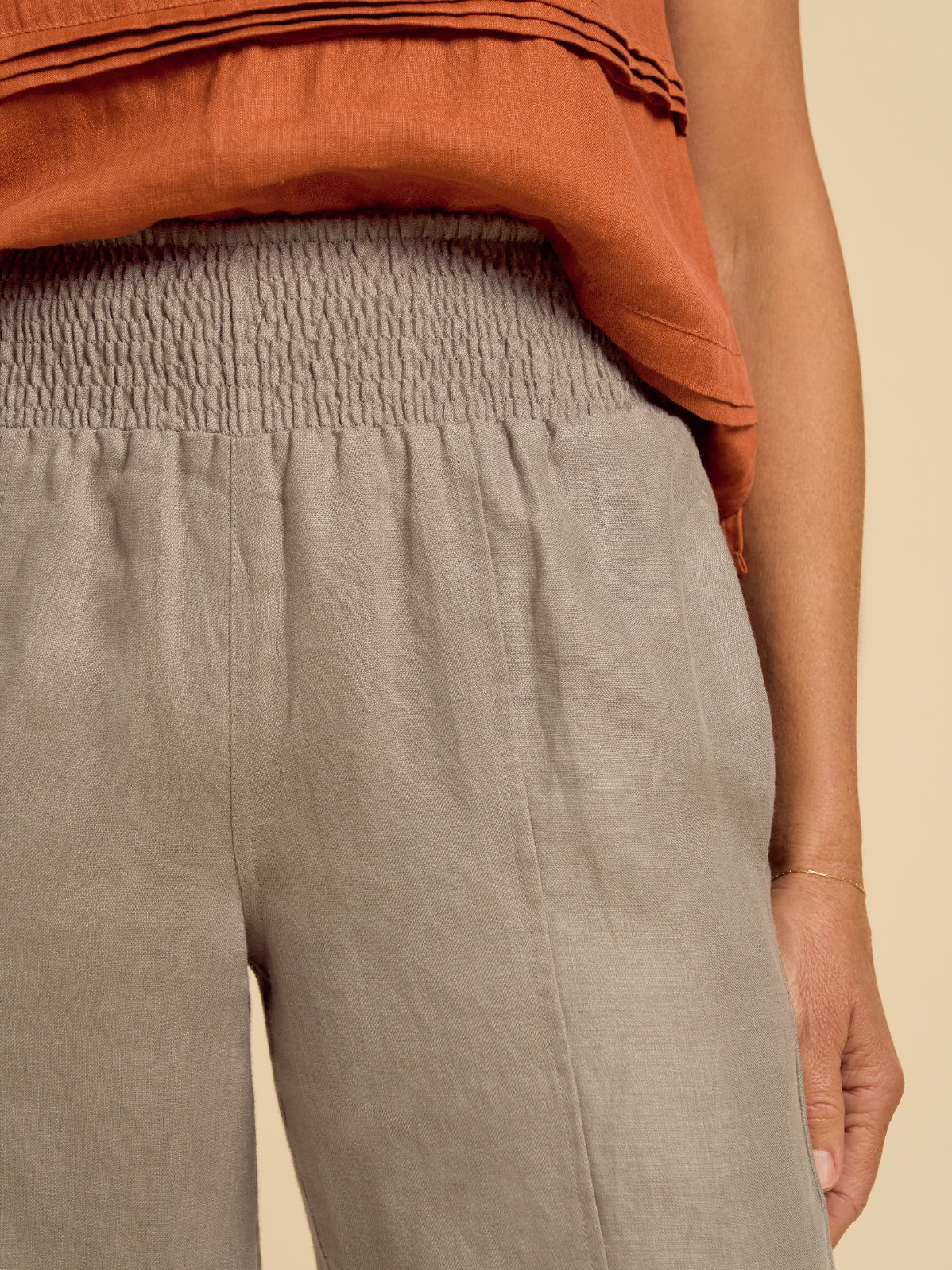 Model wears Morrissey Linen Pants in Taupe