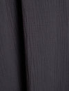 Close-up of black cotton fabric texture