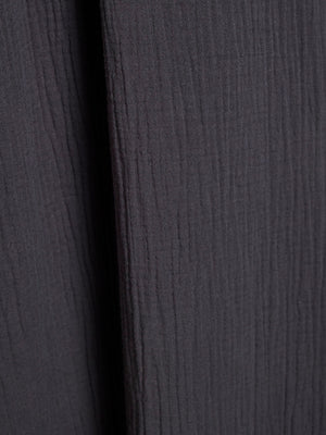 Close-up of black cotton fabric texture