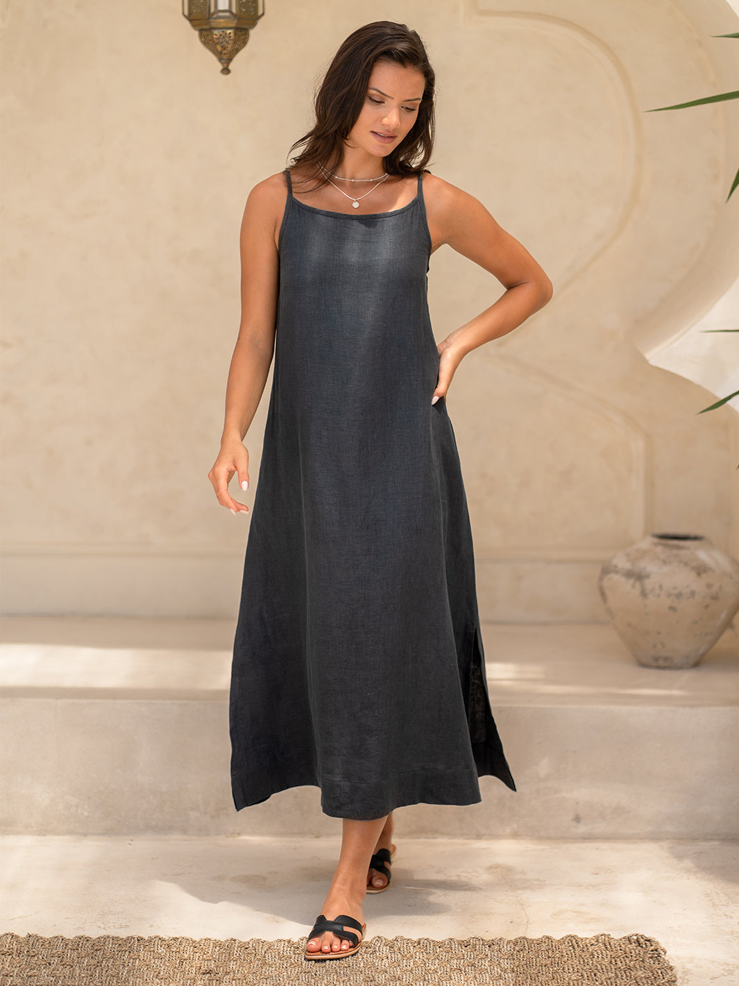 Model wears Peony Linen Dress in Charcoal