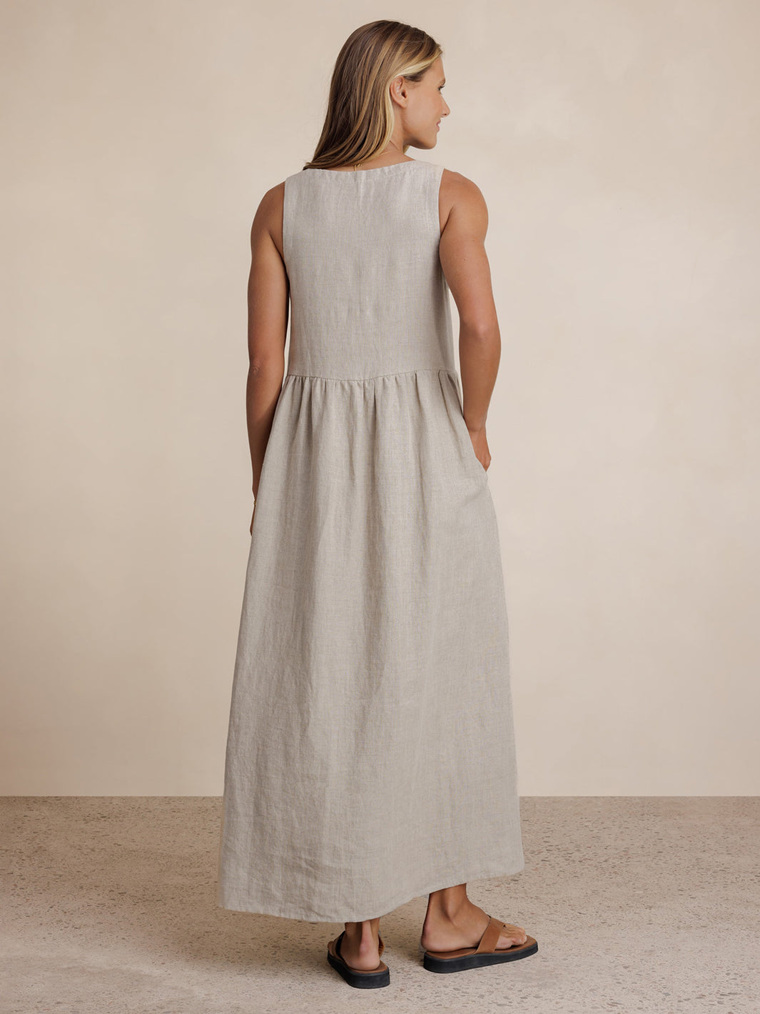 Model wears Saffron Linen Maxi Dress in Flax