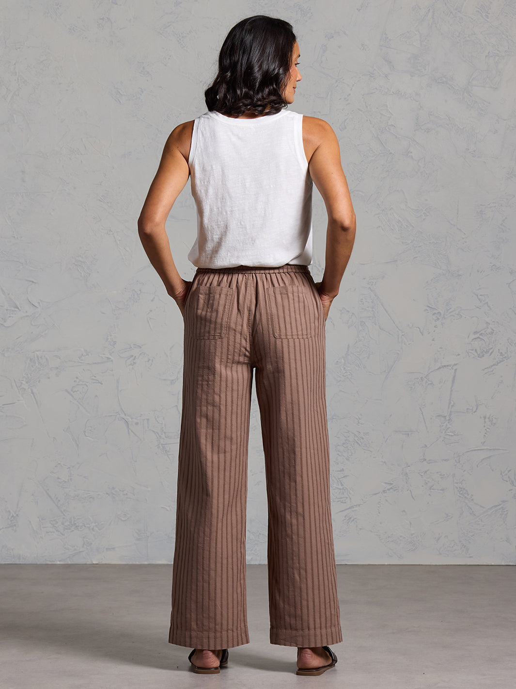 Woman wearing Sidari Organic Cotton Pants Cinnamon from Nomad the Label