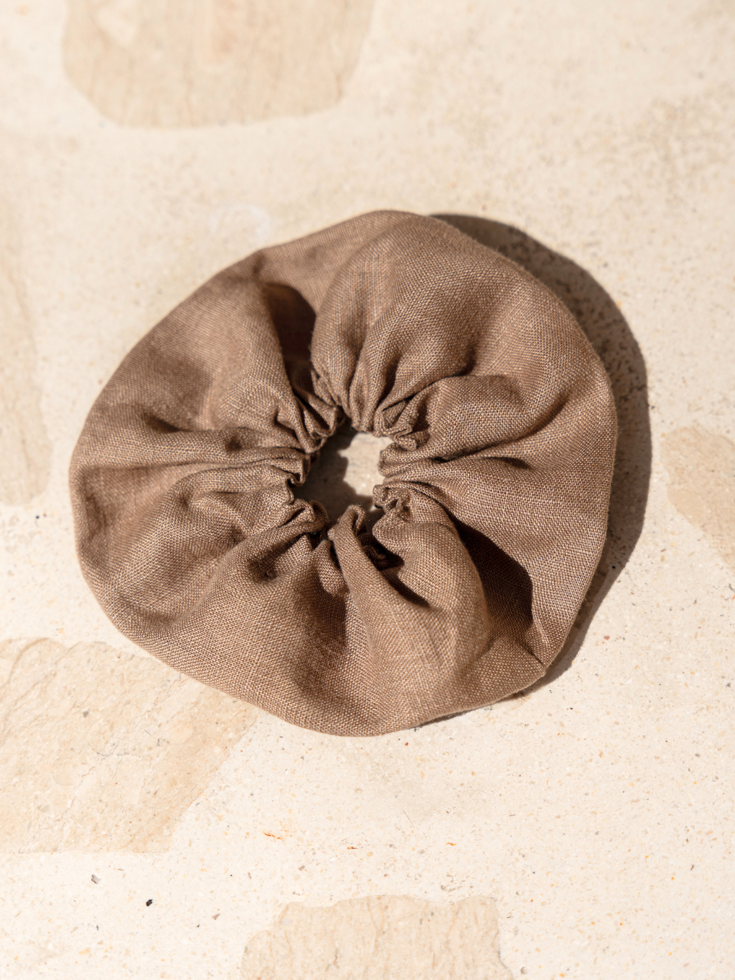 Image features Jumbo Linen Scrunchie in Cinnamon.