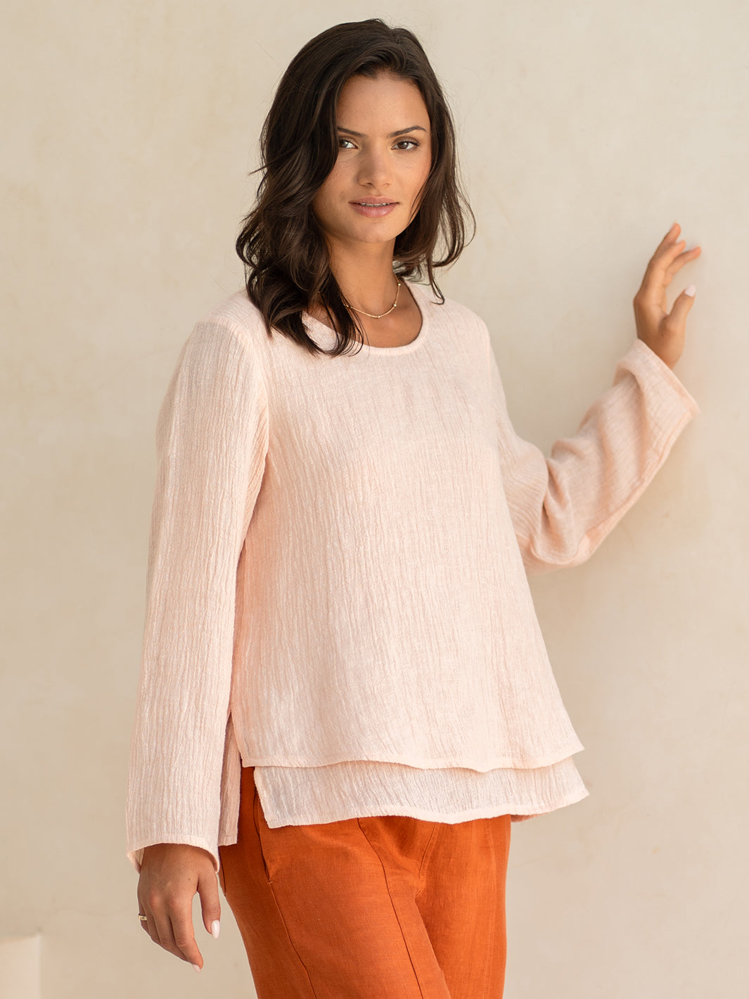Model wears Viola Linen Top in Coral