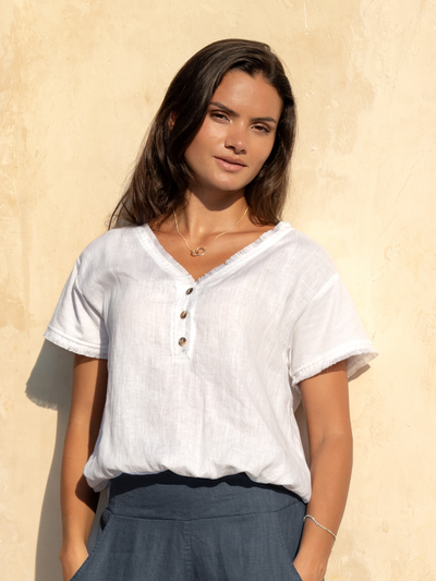 Model wears Vivre Linen and Cotton Blouse in White