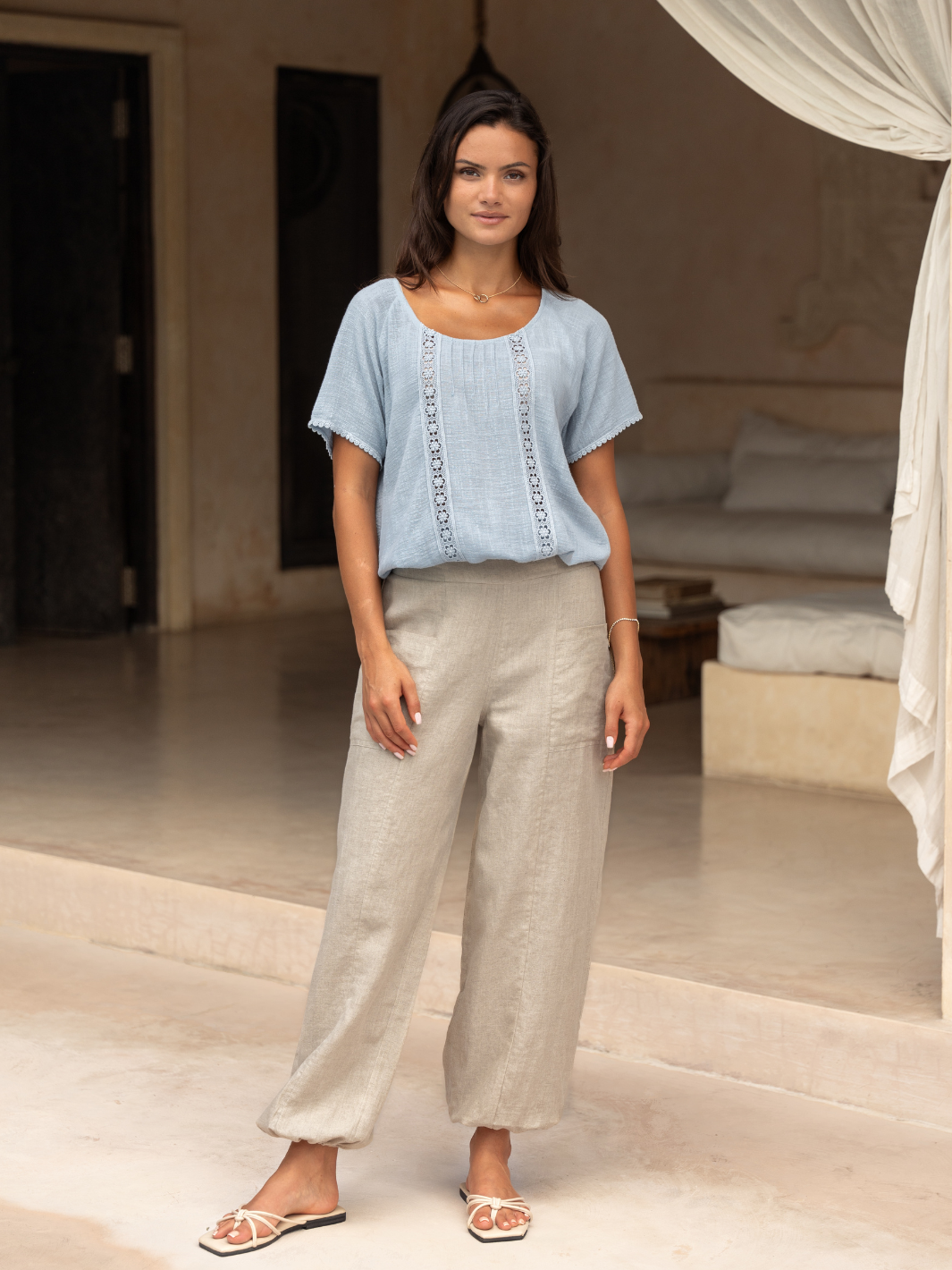 Model wears Malibu Linen Pants in Flax