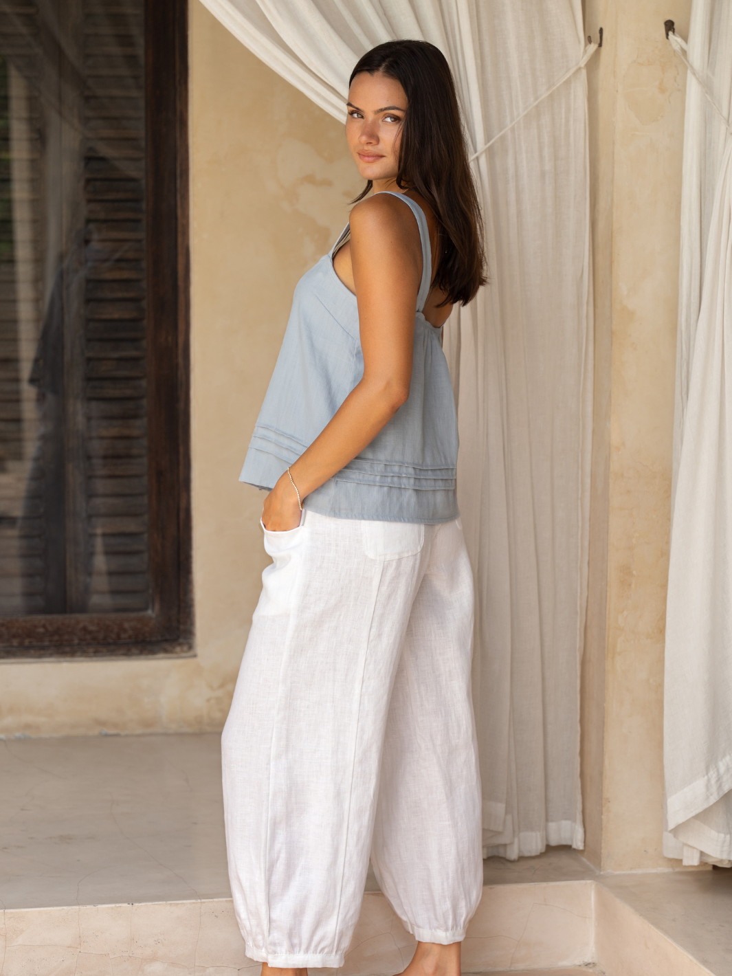 Model wears Sadhu French Linen Pants Regular in White