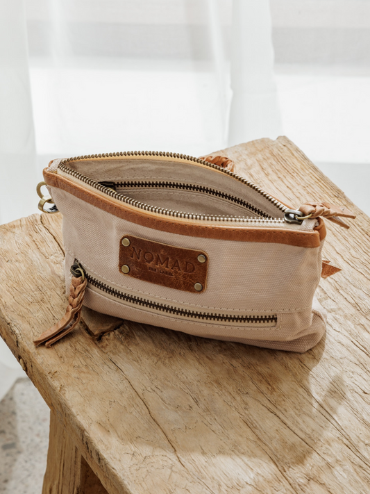 Image features Avalon Canvas Clutch in Tea Rose