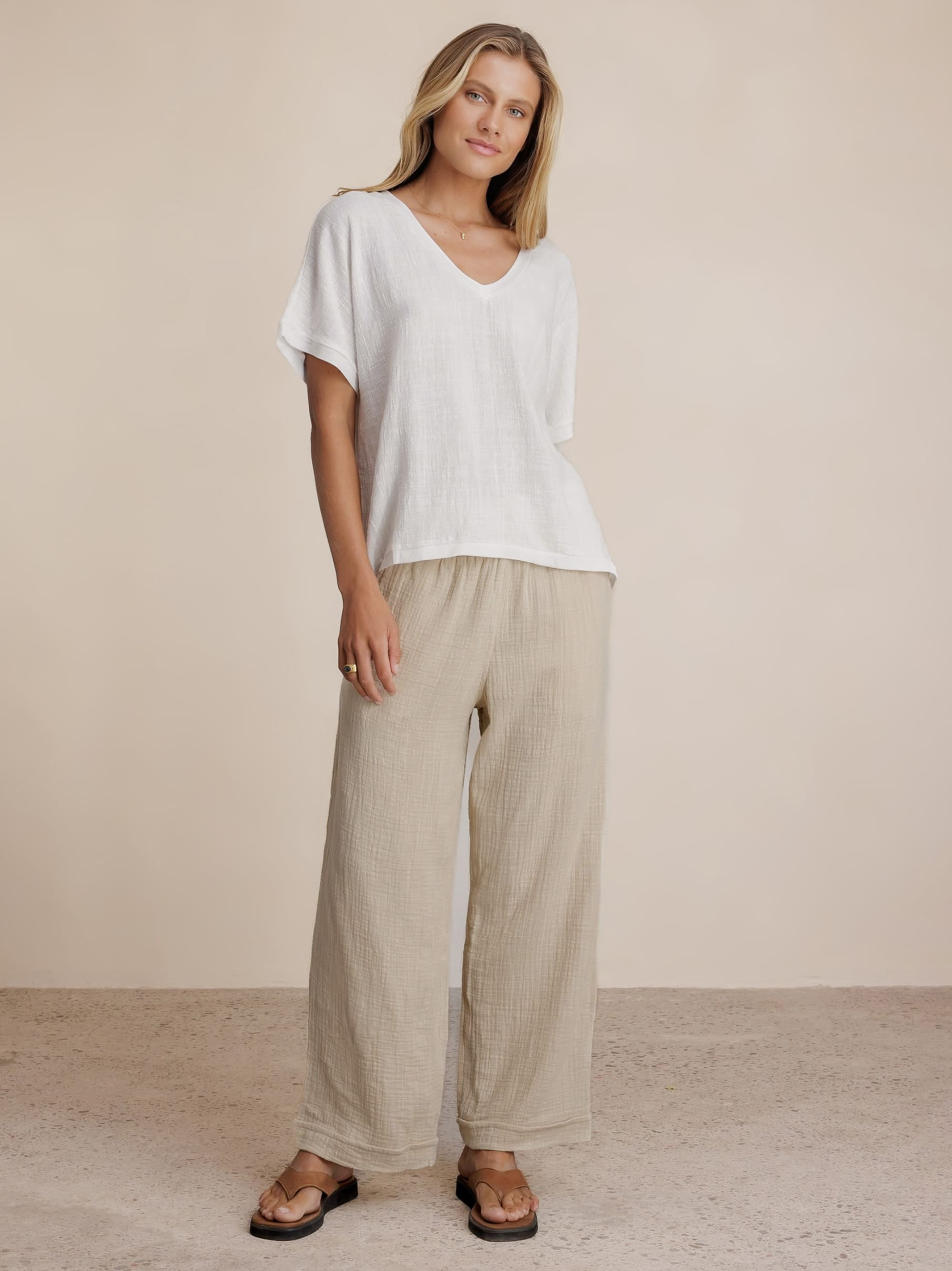 Model wears Sancia Cotton Pants in Stone