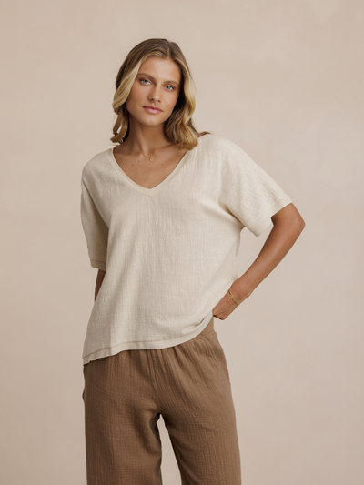 Model wears Sancia Cotton Pants in Desert Sand