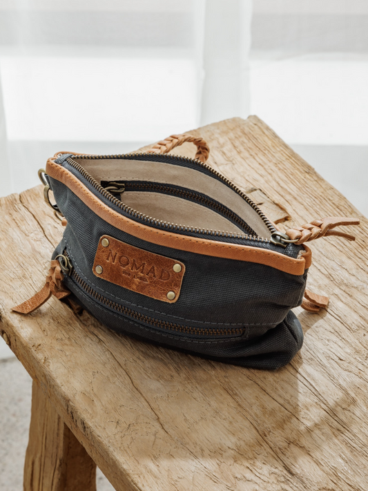 Image features Avalon Canvas Clutch in  Charcoal.