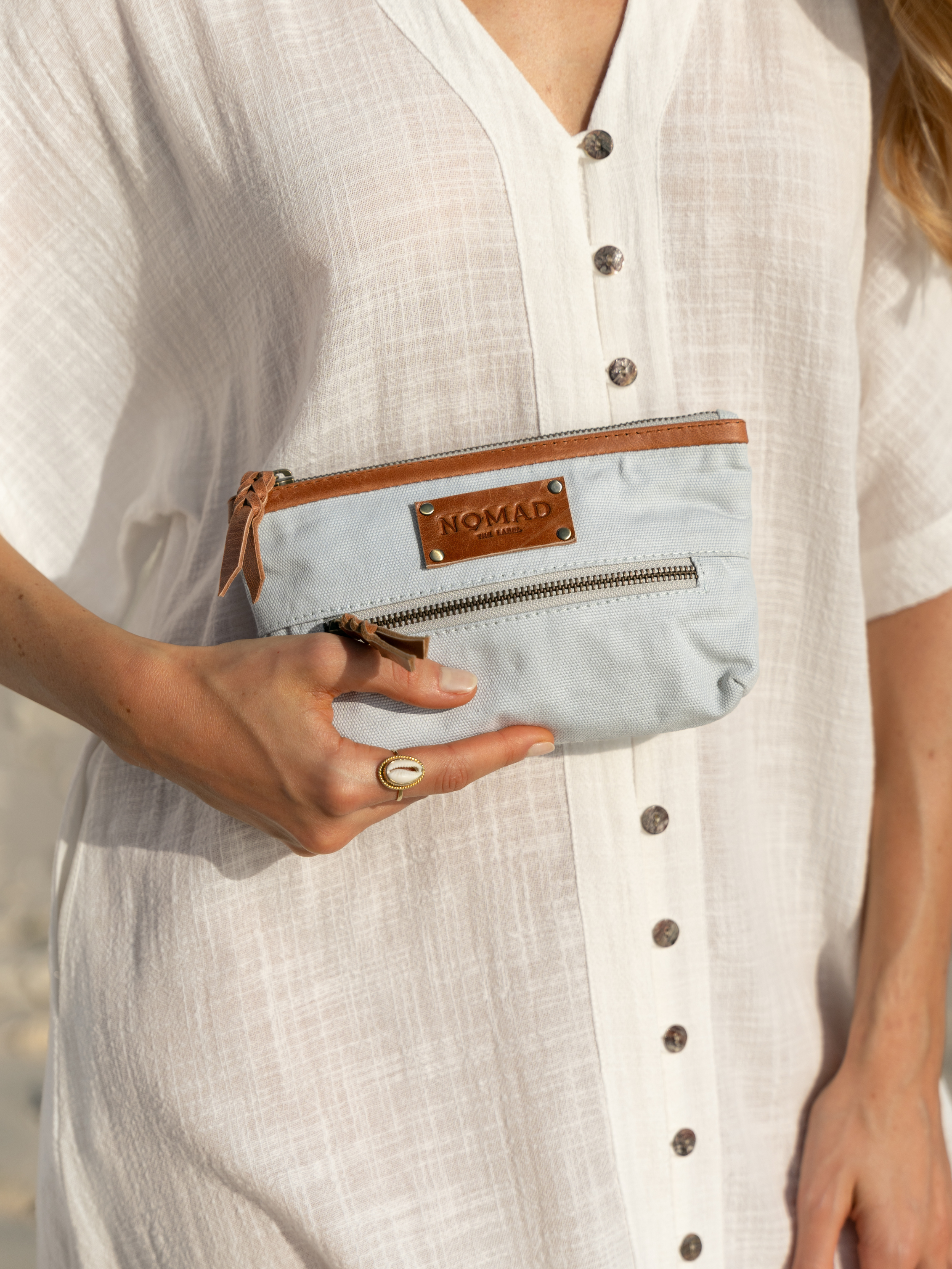 Image features Image features Avalon Canvas Clutch in Slate Blue.