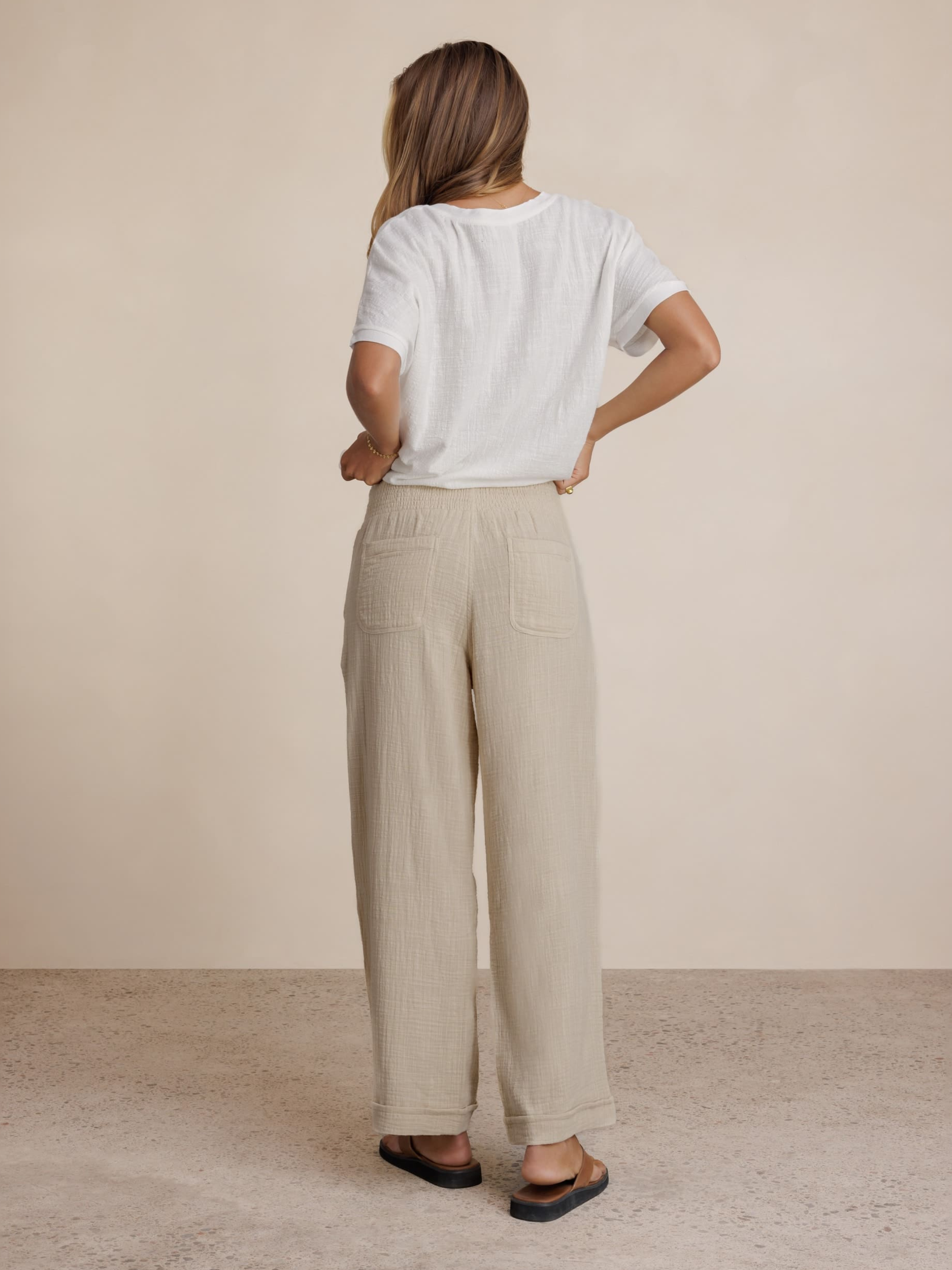 Model wears Sancia Cotton Pants in Stone