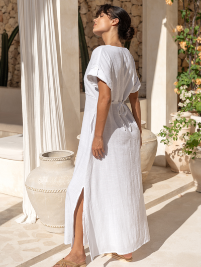 Model wears Catalina Cotton Dress in White