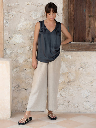 Model is wearing Alba Bamboo Top in Charcoal