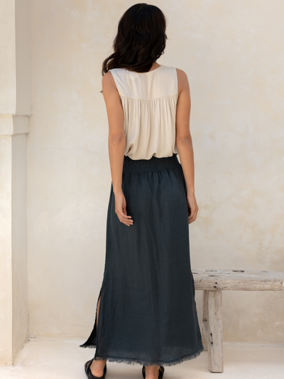 Model wears Aurora French Linen Skirt in Charcoal