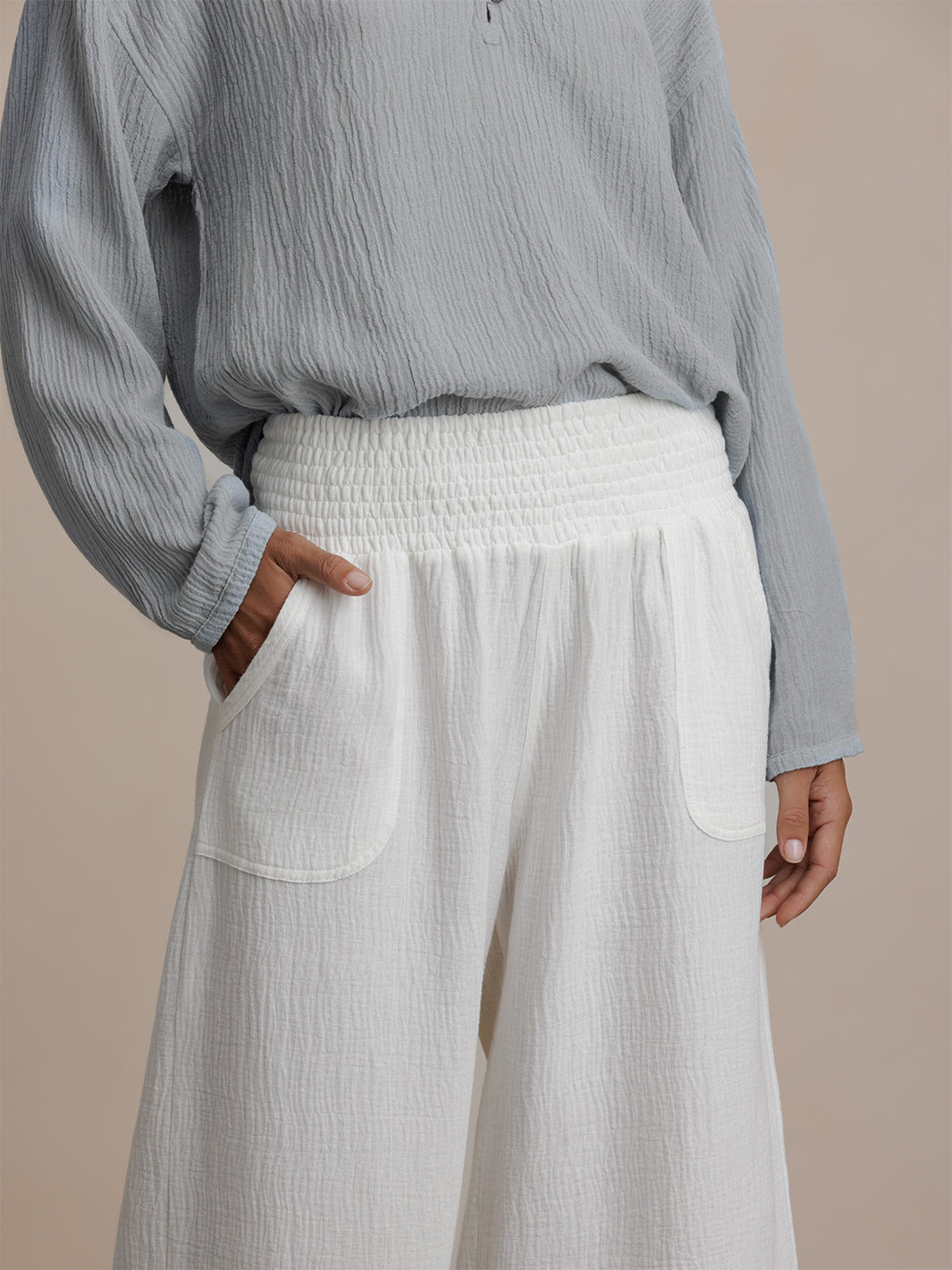 Model wears Bahama 3/4 Cotton Pants in Coconut