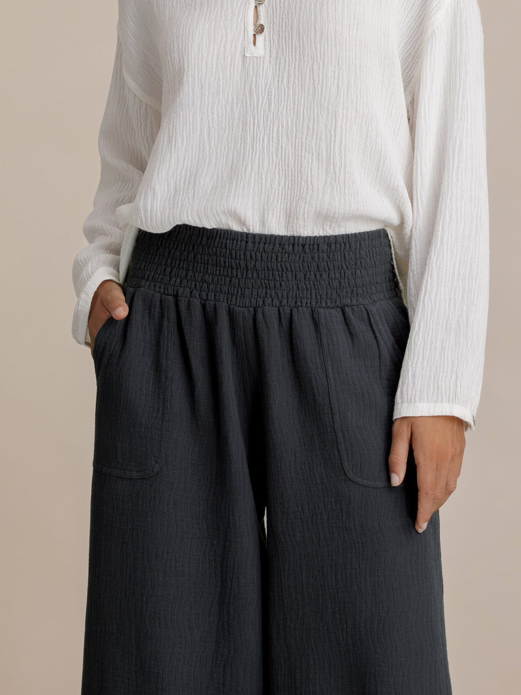 Model wears Bahama 3/4 Cotton Pants in Charcoal