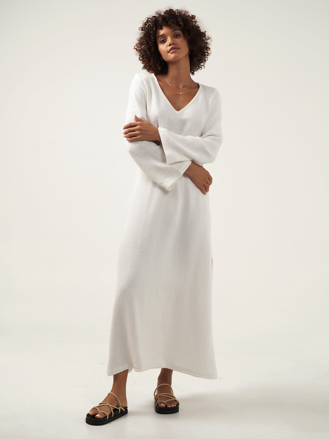 Model is wearing the Cielo Ramie Dress in Ivory