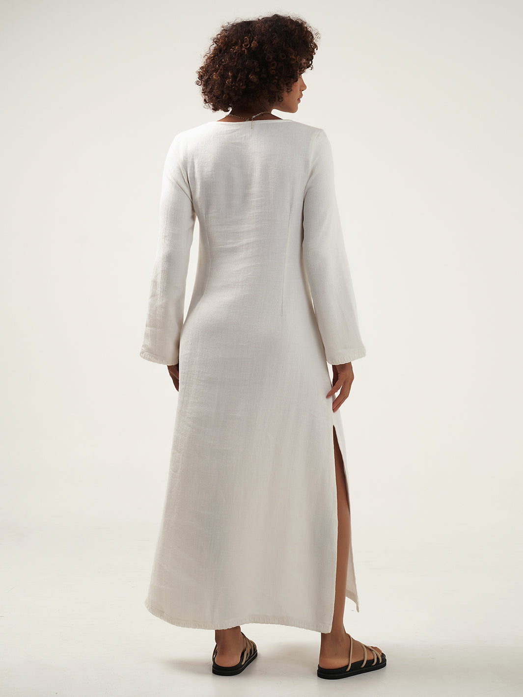 Model is wearing the Cielo Ramie Dress in Ivory