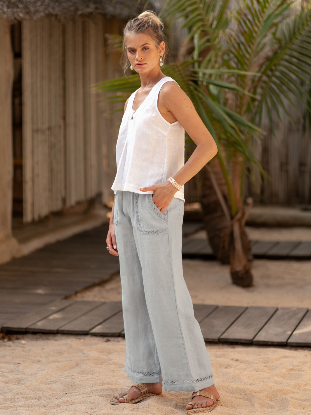 Model wears Cebu Linen Pants in Slate Blue