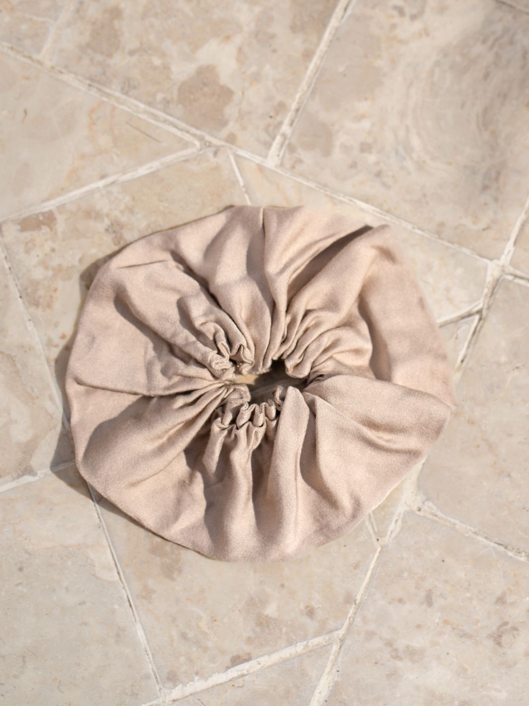 Image features Jumbo Bamboo Scrunchie in Champagne