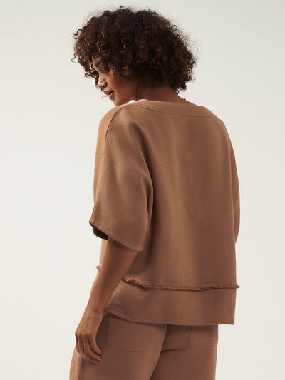 Model wears Floris Ramie Top in Desert Sand