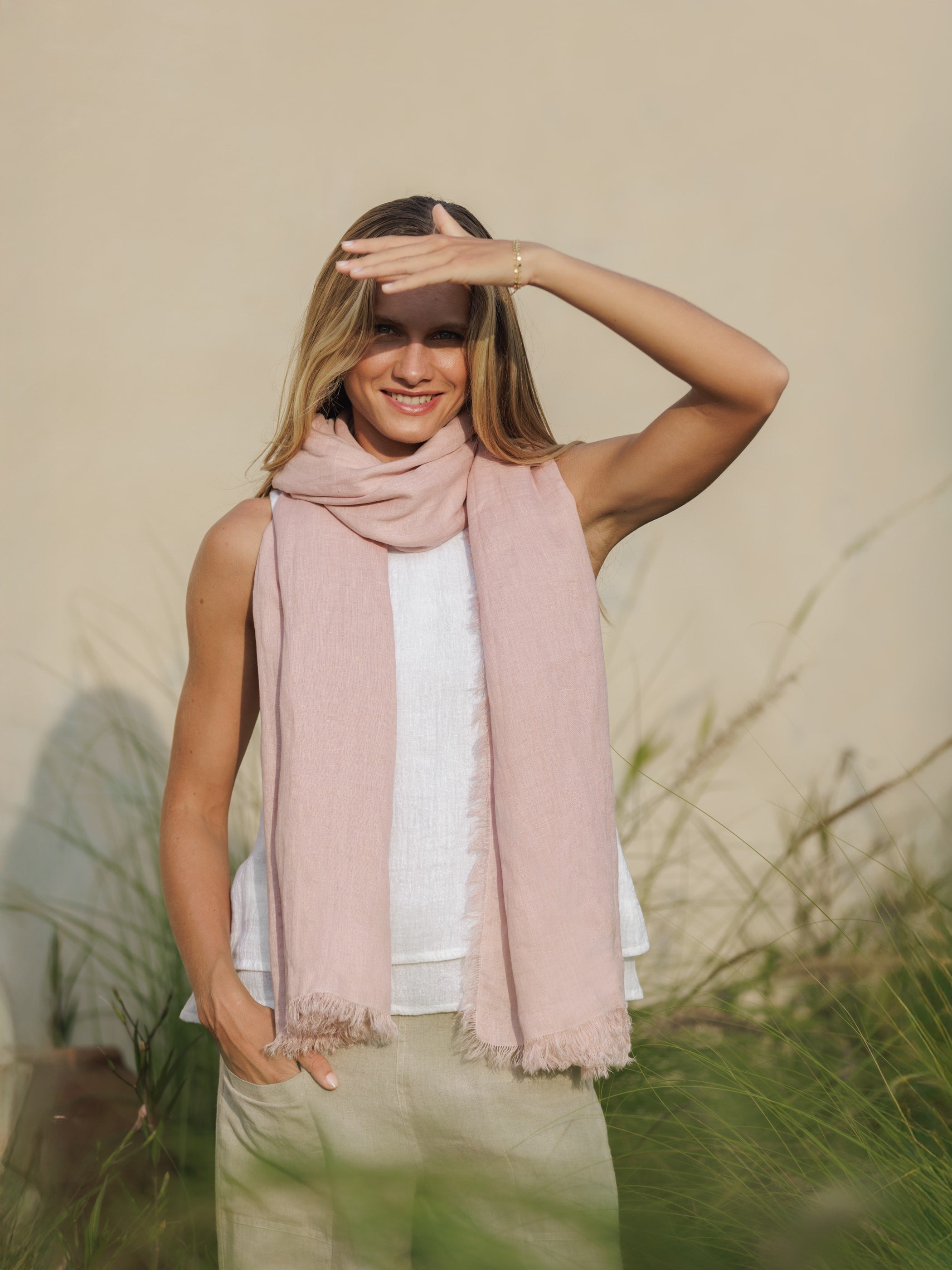 Model wears Omari Linen Scarf in Dusty Rose.