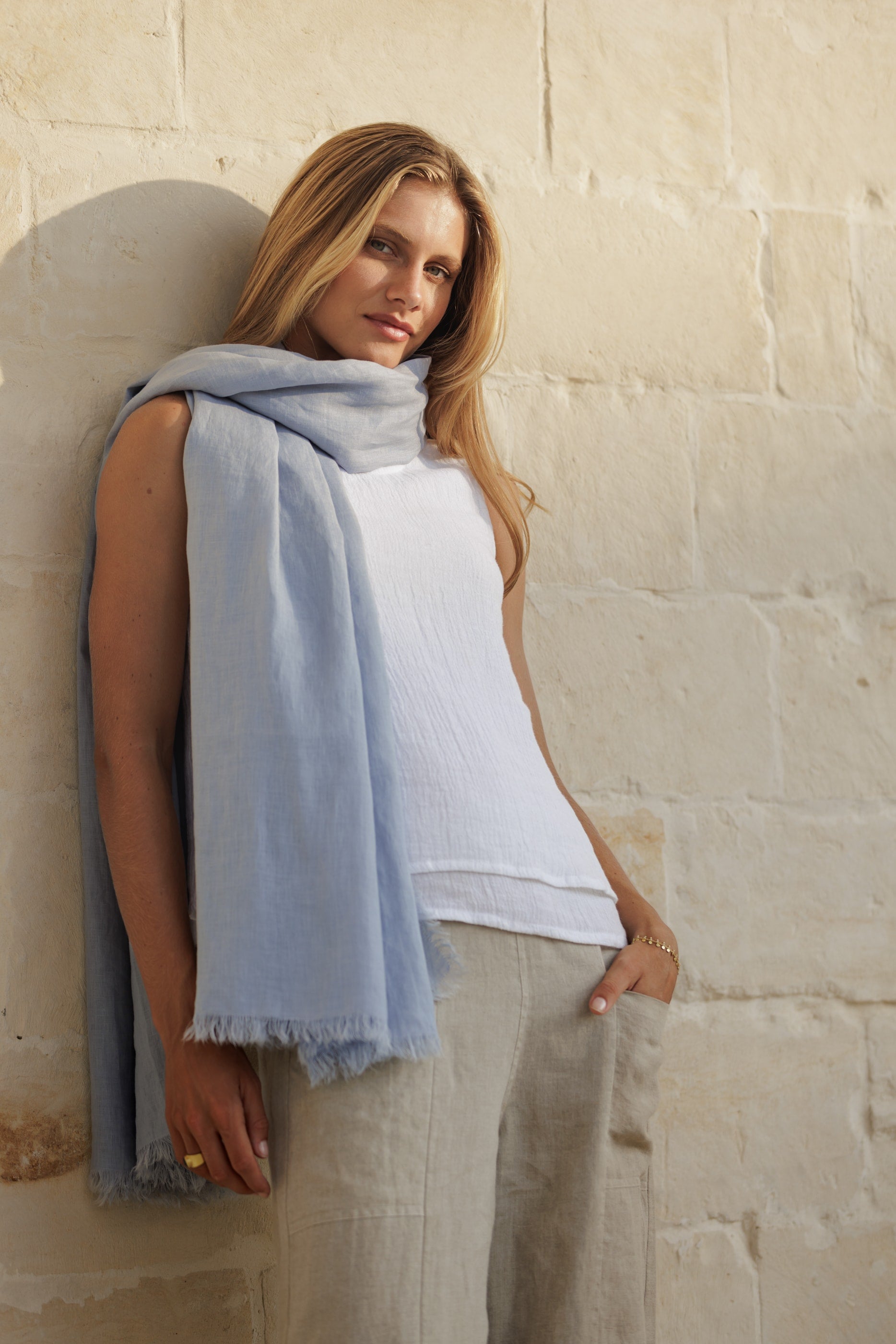 Model wears Omari Linen Scarf in Slate Blue