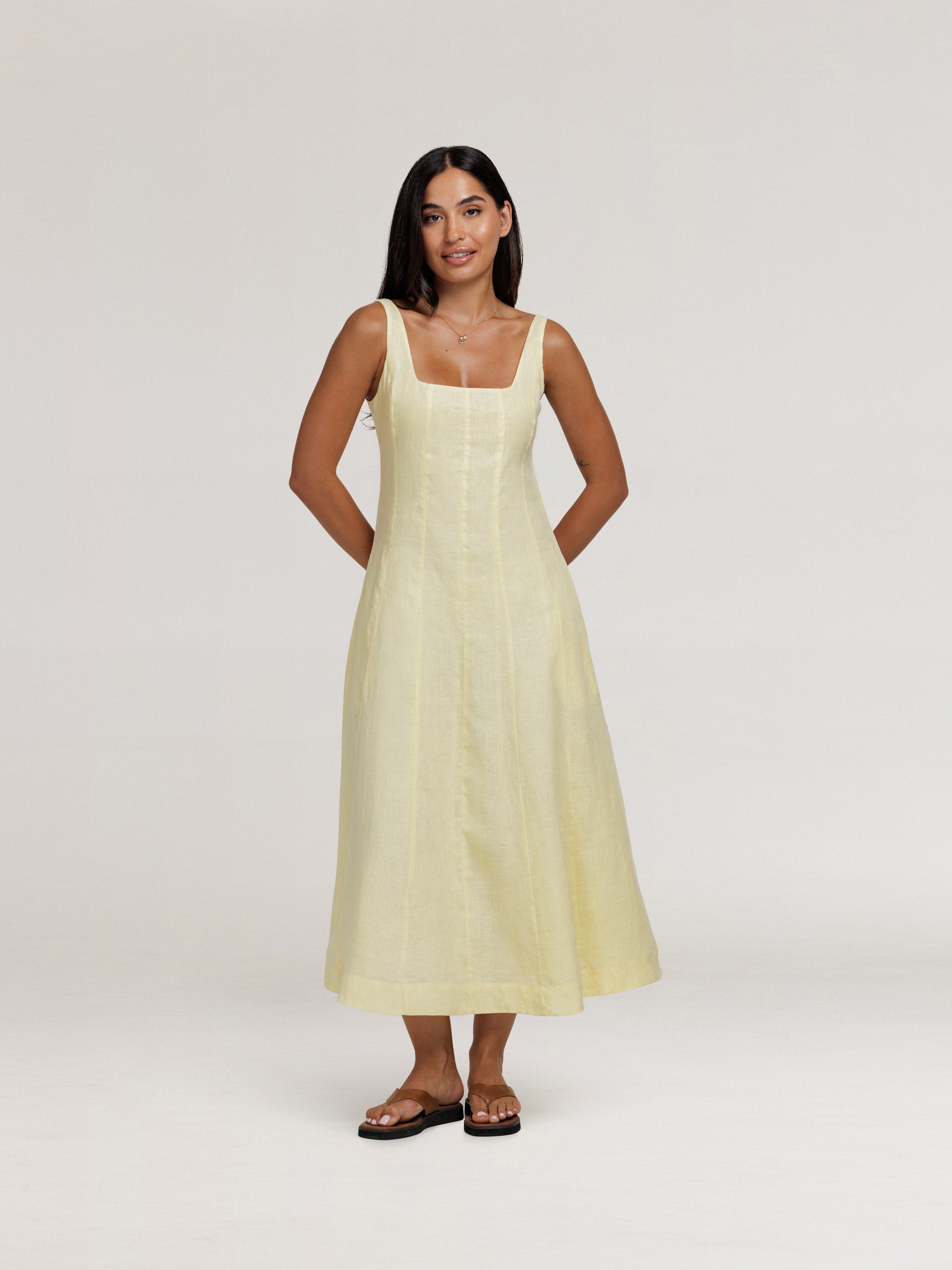 Model wears Rosalina Linen Midi Dress in  Lemon