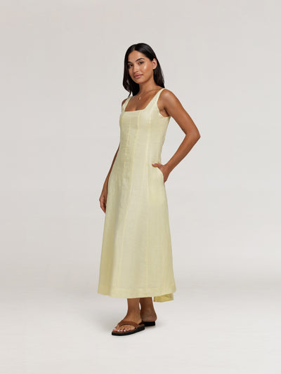 Model wears Rosalina Linen Midi Dress in  Lemon