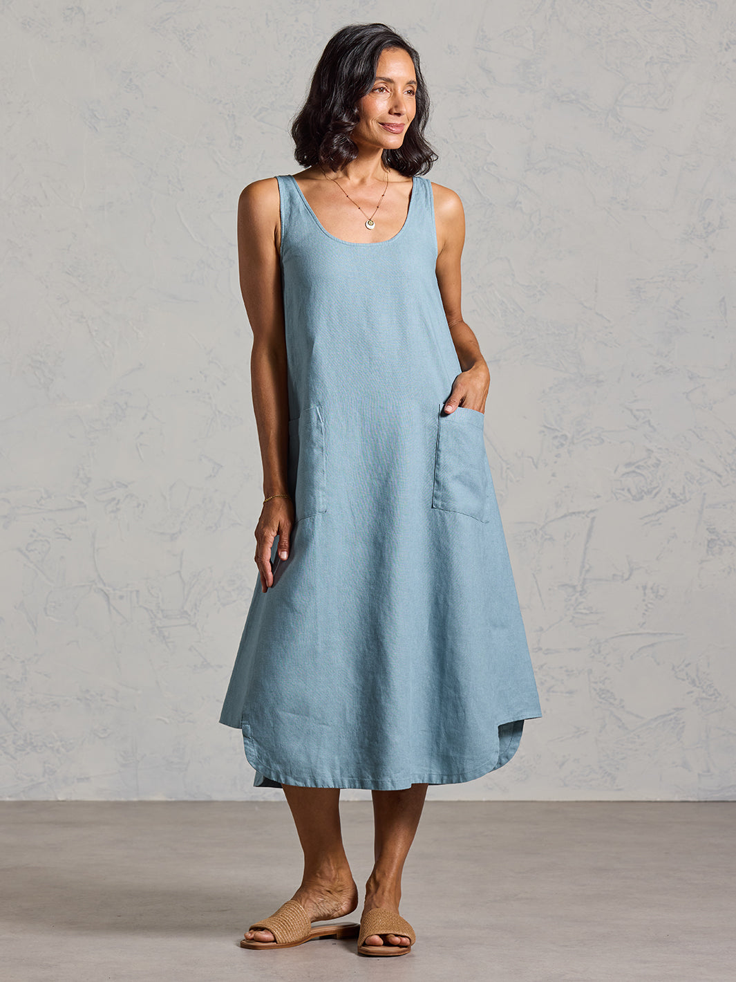 Model wearing Laurel French Linen Dress in Tahiti Blue colour