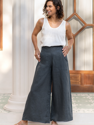 Model wears Portillo Linen Pants in Charcoal