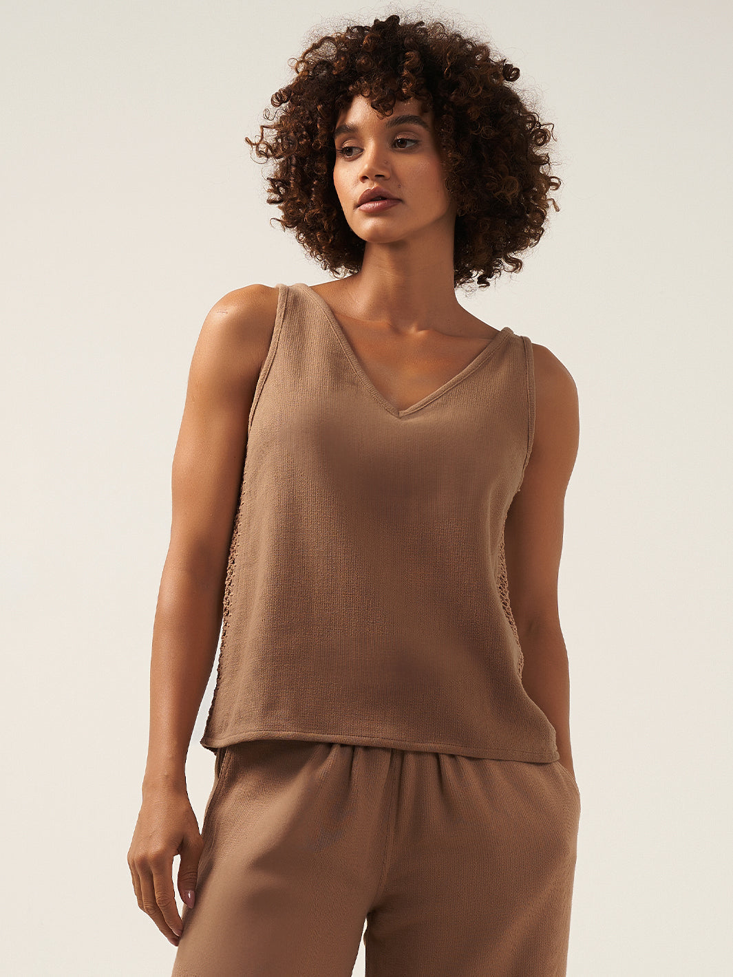 Model wears Palmera Ramie Top in Desert Sand