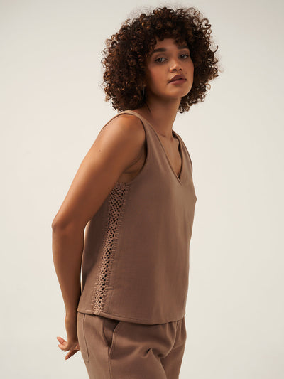 Model wears Palmera Ramie Top in Desert Sand