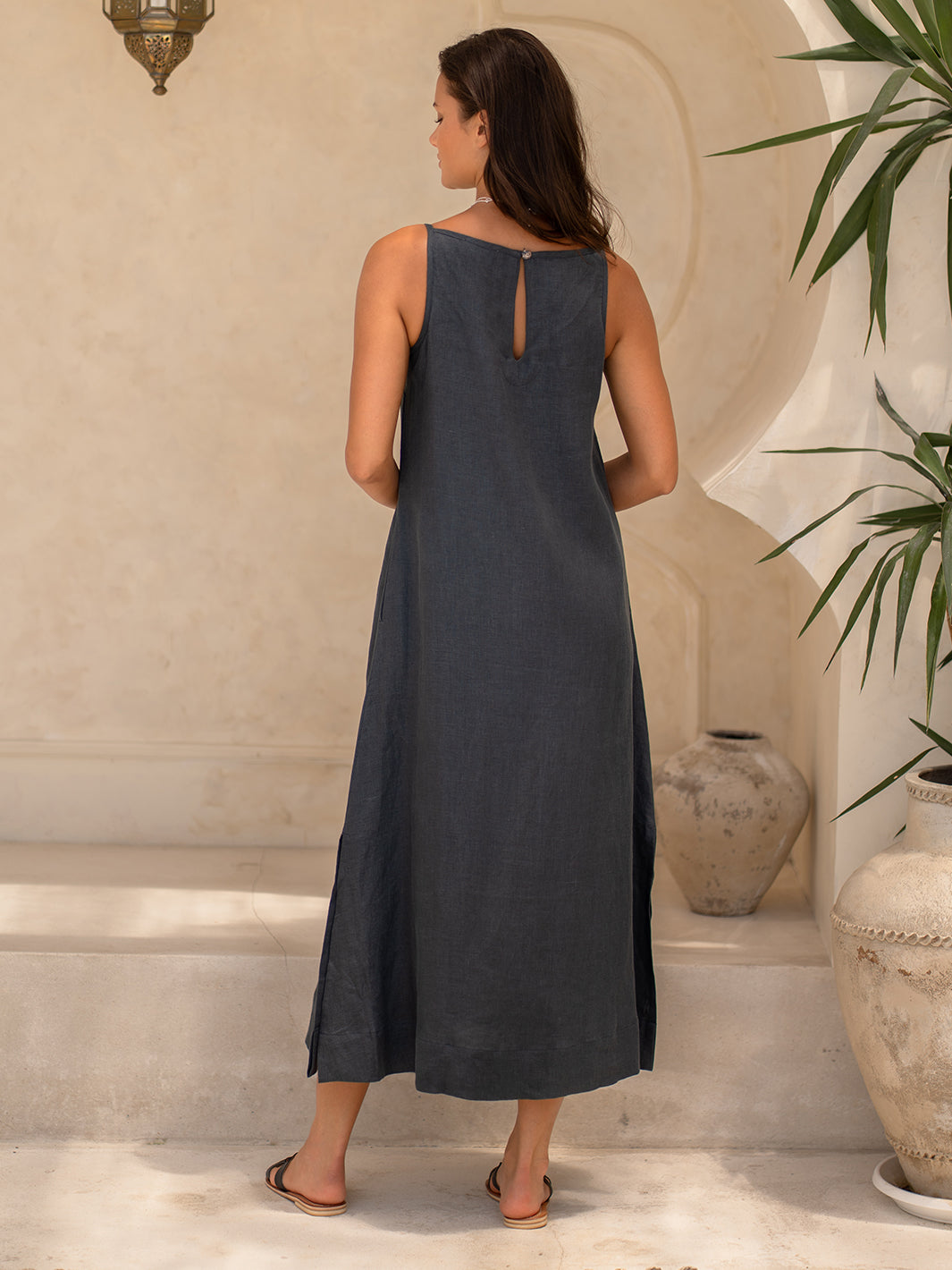 Model wears Peony Linen Dress in Charcoal