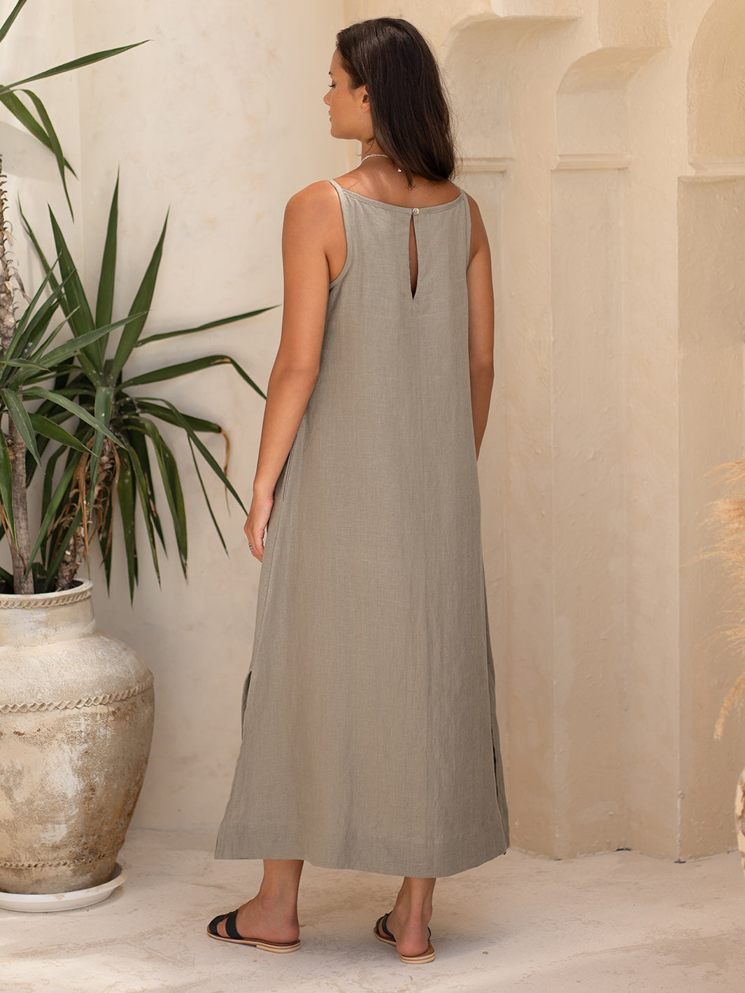 Model wears Peony Linen Dress in Taupe