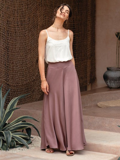 Model wears Palazzo Ecovero™ Pants in Plum