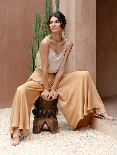 Model wears Palazzo Ecovero™ Pants in Camel