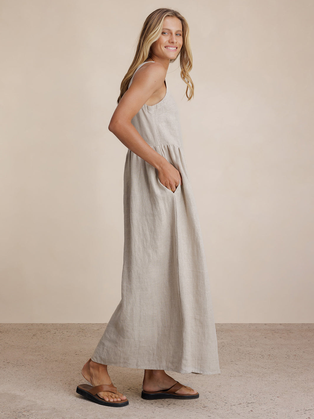 Model wears Saffron Linen Maxi Dress in Flax