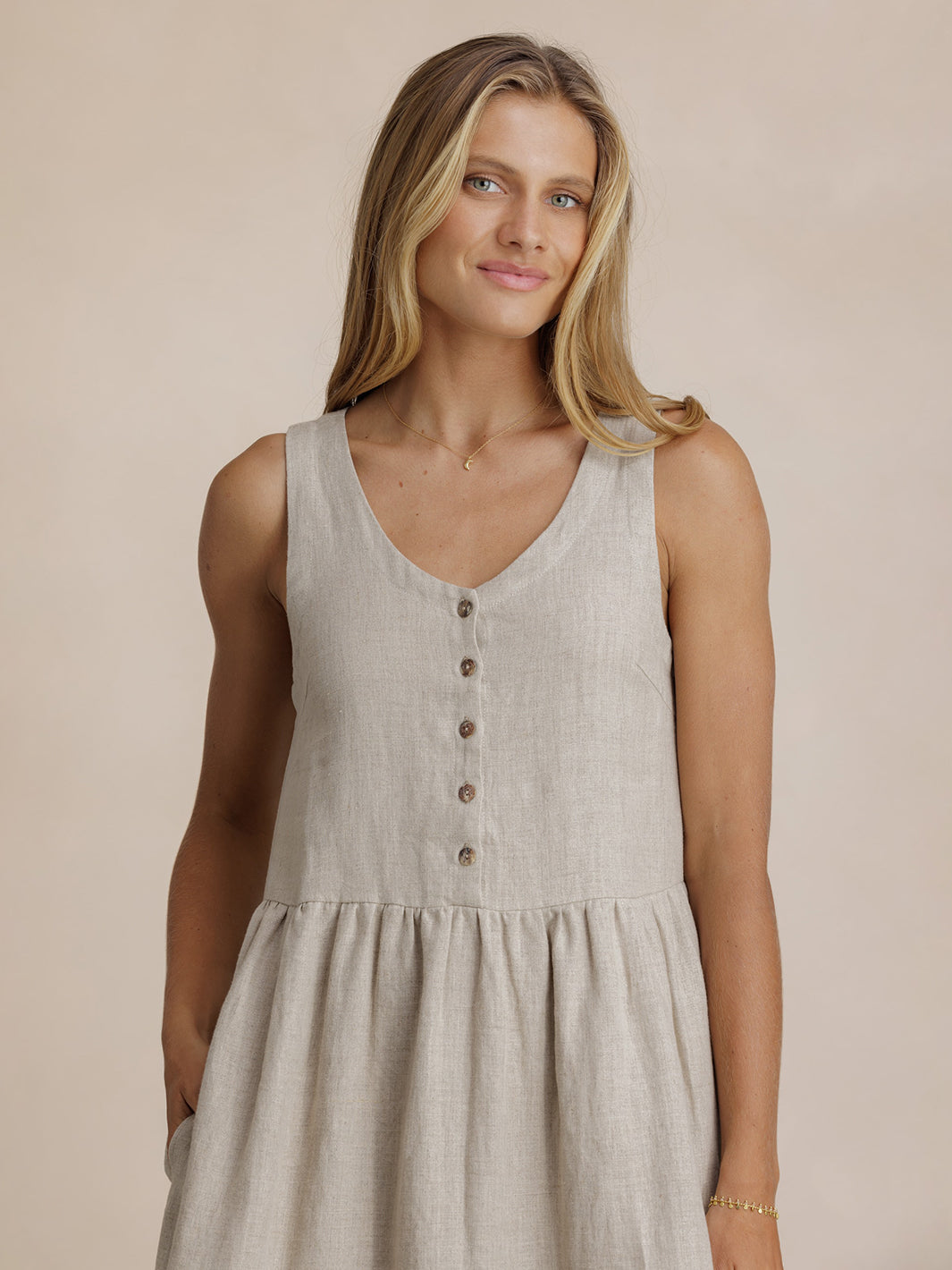 Model wears Saffron Linen Maxi Dress in Flax