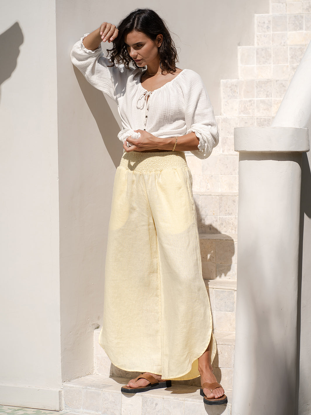 Model wears Sienna Linen Pants in Lemon