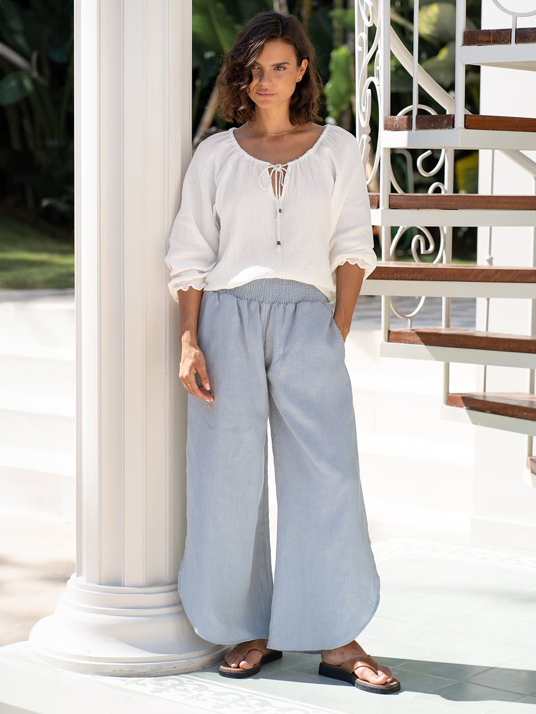 Model wears Sienna Linen Pants in Slate Blue