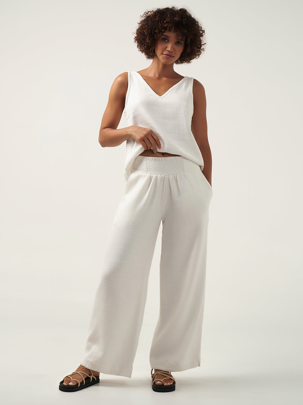 Model is wearing Sula Ramie Pants in Ivory