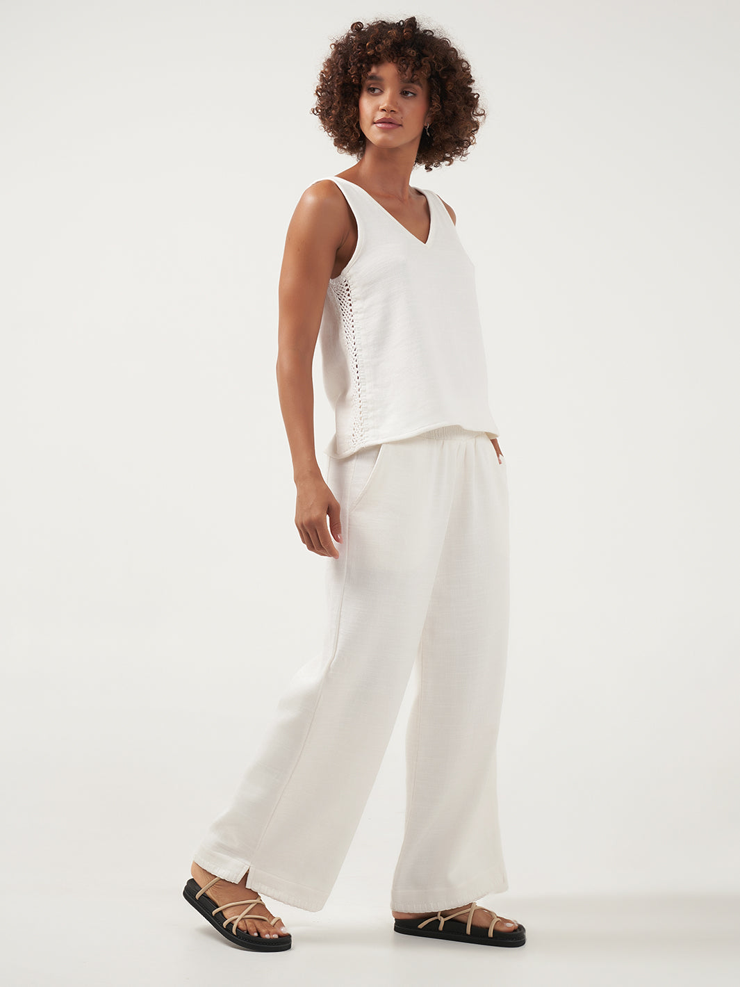 Model is wearing Sula Ramie Pants in Ivory